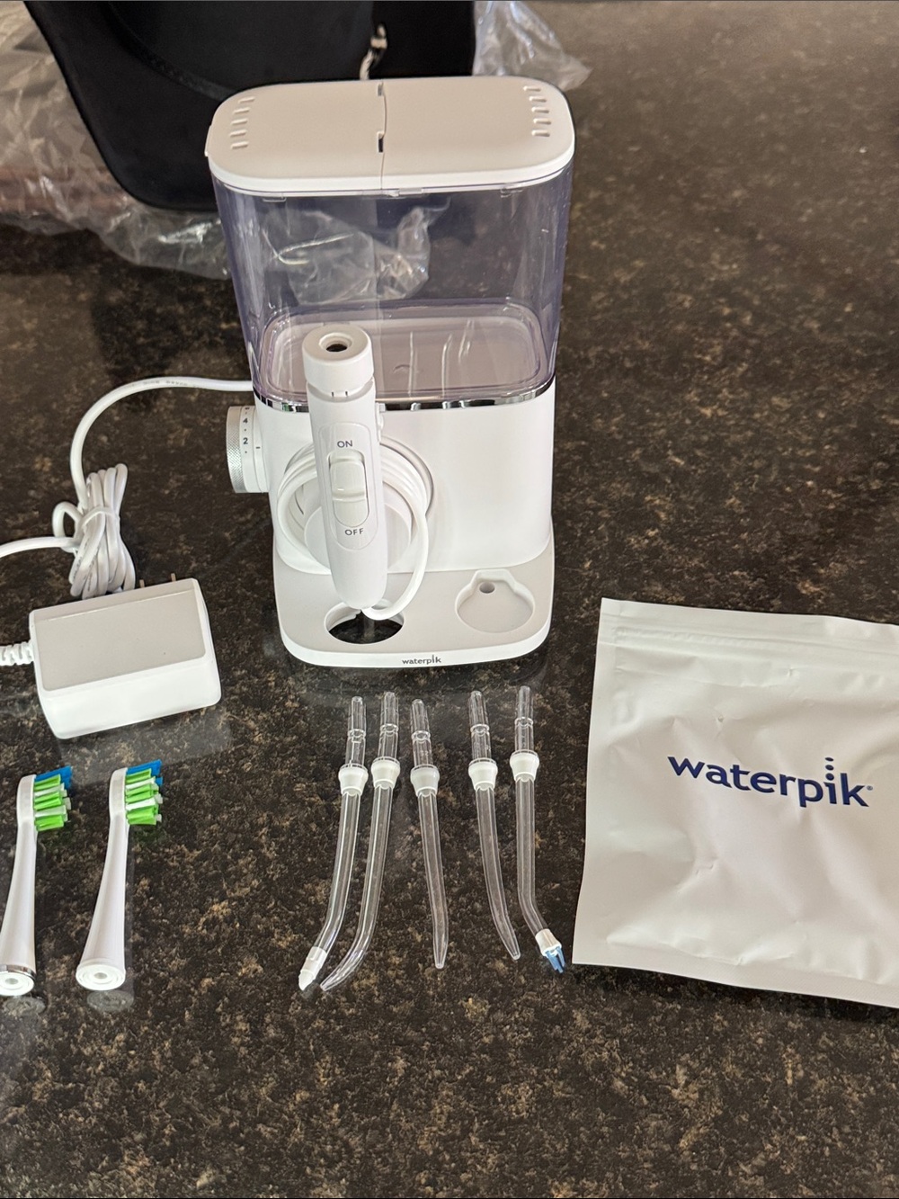 WATERPIK™️ Waterflosser + 5 Tips & 2 Toothbrush Heads